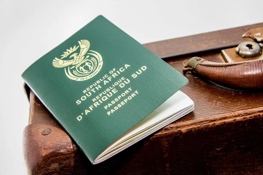 closeup-shot-south-african-passport-brown-baggage